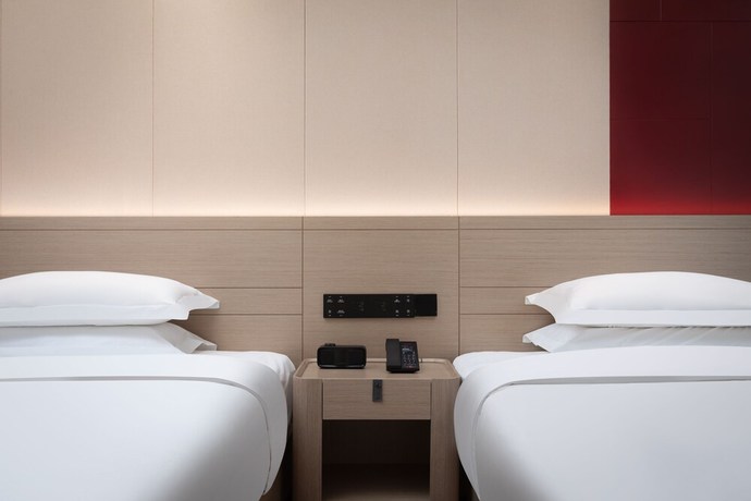 Imagen de la habitación del Hotel Ramada By Wyndham Honghe Kaiyuan. Foto 16