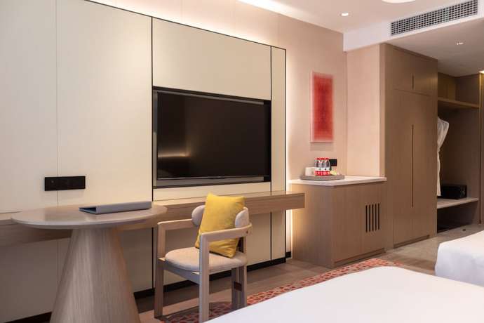 Imagen de la habitación del Hotel Ramada By Wyndham Honghe Kaiyuan. Foto 18