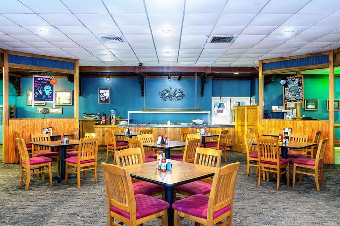 Imagen del bar/restaurante del Hotel Ramada By Wyndham Houma. Foto 2