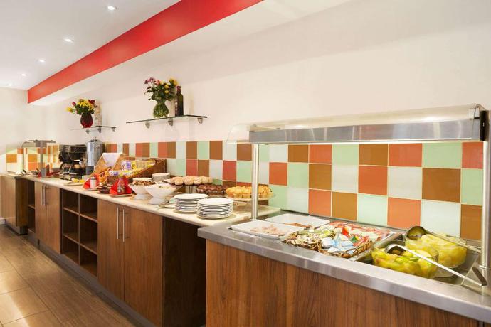 Imagen del bar/restaurante del Hotel Ramada By Wyndham Hounslow - Heathrow East. Foto 6