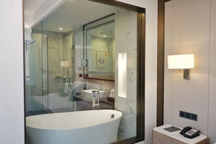 Imagen de la habitación del Hotel Ramada By Wyndham Huizhou Longmen. Foto 13