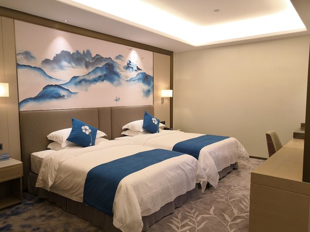 Imagen de la habitación del Hotel Ramada By Wyndham Huizhou Longmen. Foto 15
