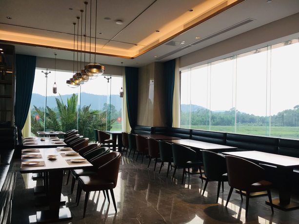 Imagen del bar/restaurante del Hotel Ramada By Wyndham Huizhou Longmen. Foto 3