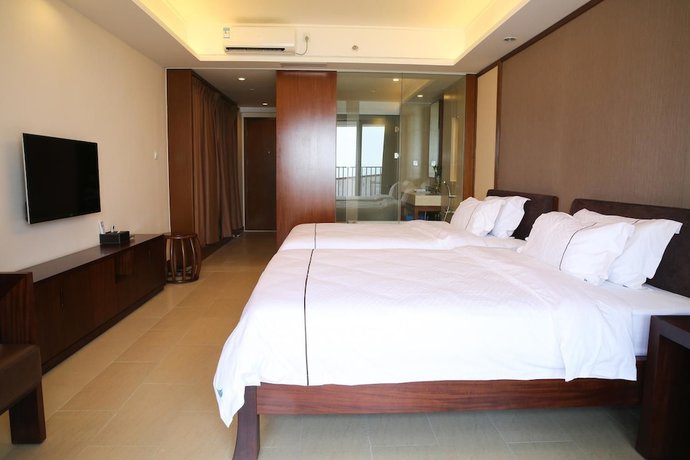 Imagen de la habitación del Hotel Ramada By Wyndham Huizhou Xunliao Bay. Foto 4