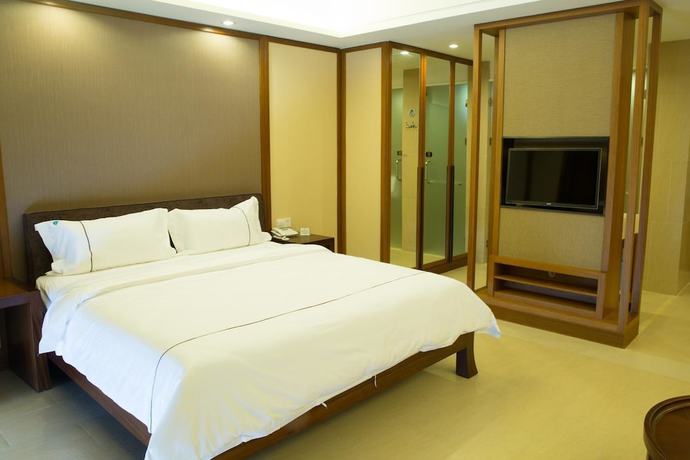 Imagen de la habitación del Hotel Ramada By Wyndham Huizhou Xunliao Bay. Foto 7