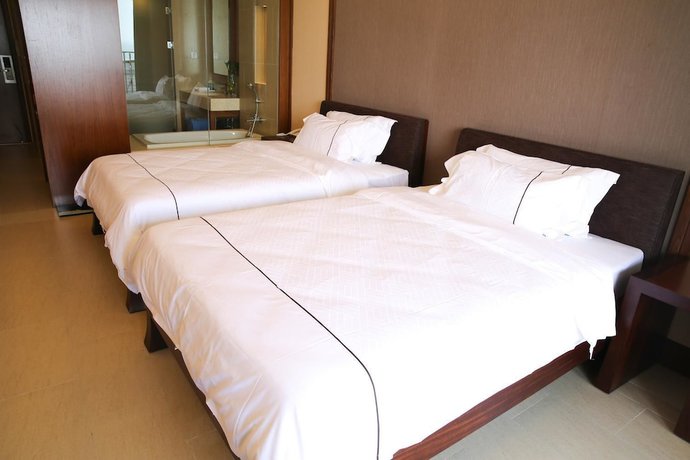 Imagen de la habitación del Hotel Ramada By Wyndham Huizhou Xunliao Bay. Foto 8