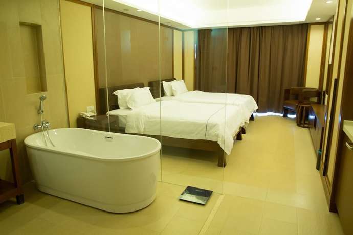 Imagen de la habitación del Hotel Ramada By Wyndham Huizhou Xunliao Bay. Foto 16