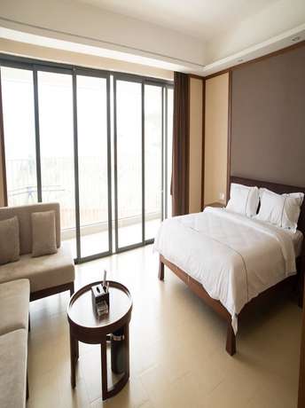 Imagen de la habitación del Hotel Ramada By Wyndham Huizhou Xunliao Bay. Foto 18