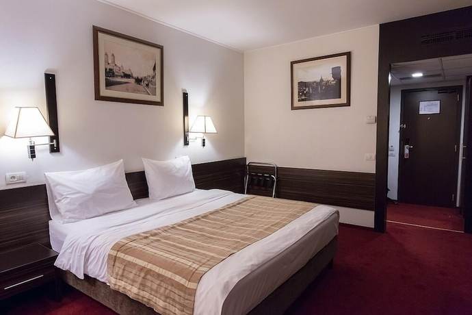 Imagen de la habitación del Hotel Ramada By Wyndham Iasi City Centre. Foto 10