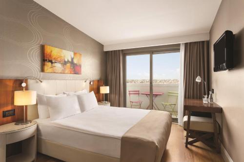 Imagen de la habitación del Hotel Ramada By Wyndham Istanbul Grand Bazaar. Foto 10