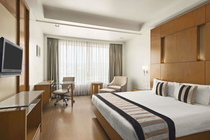 Imagen de la habitación del Hotel Ramada By Wyndham Jaipur. Foto 3