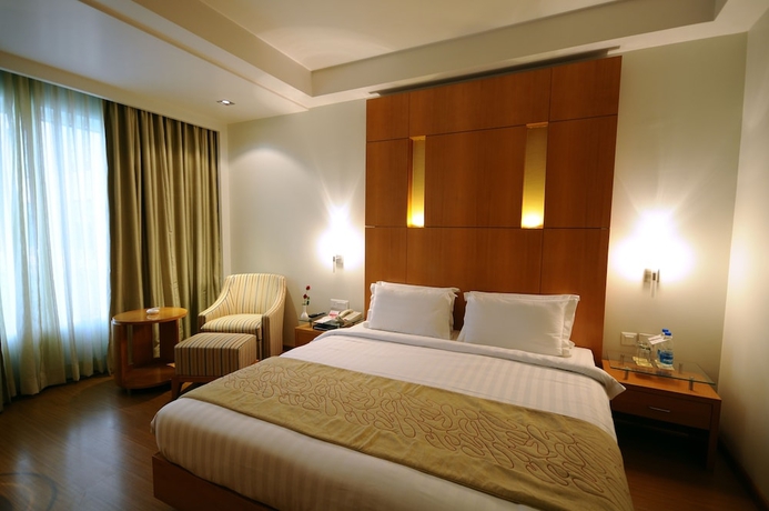 Imagen de la habitación del Hotel Ramada By Wyndham Jaipur. Foto 8