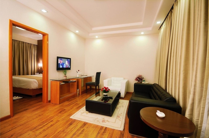 Imagen de la habitación del Hotel Ramada By Wyndham Jaipur. Foto 11