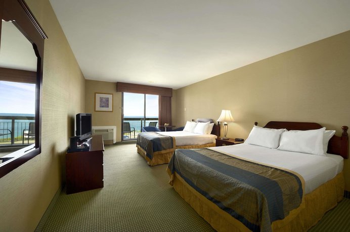 Imagen de la habitación del Hotel Ramada By Wyndham Jordan/beacon Harbourside Resort. Foto 3