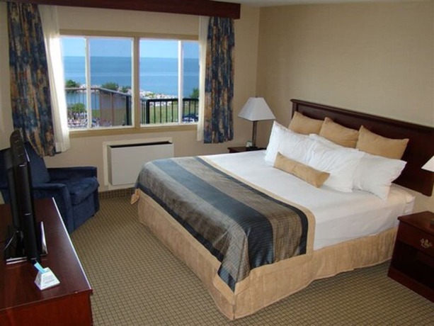Imagen de la habitación del Hotel Ramada By Wyndham Jordan/beacon Harbourside Resort. Foto 5