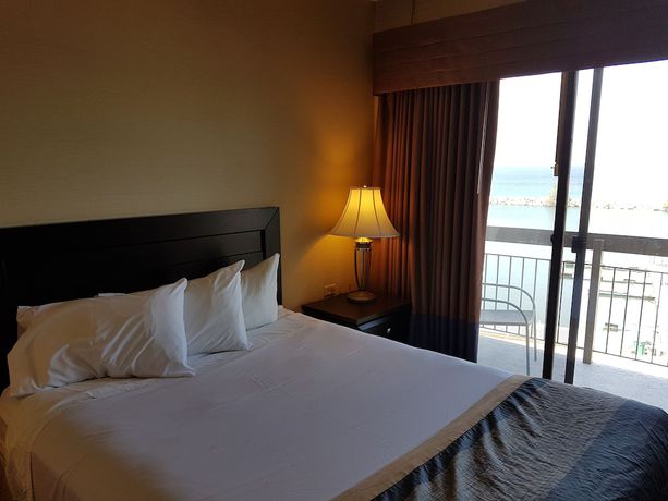Imagen de la habitación del Hotel Ramada By Wyndham Jordan/beacon Harbourside Resort. Foto 8