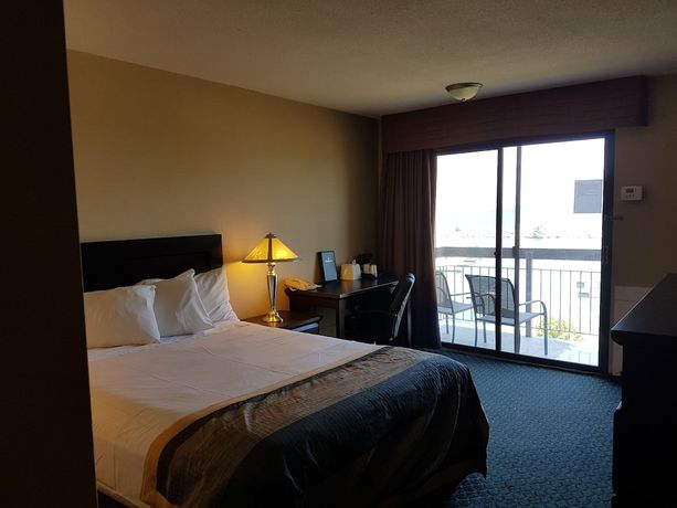 Imagen de la habitación del Hotel Ramada By Wyndham Jordan/beacon Harbourside Resort. Foto 14