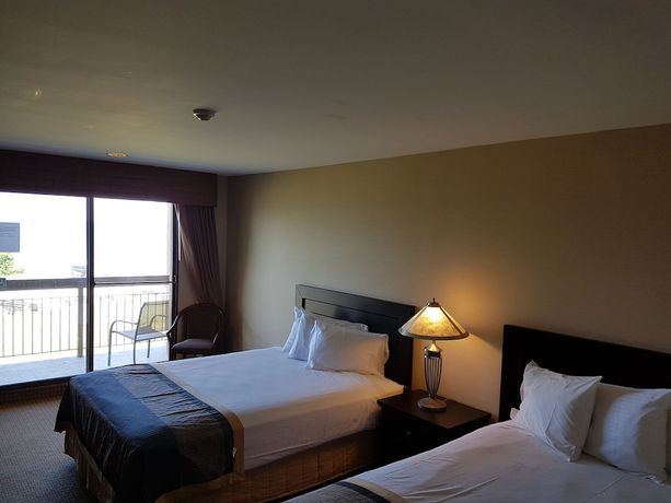 Imagen de la habitación del Hotel Ramada By Wyndham Jordan/beacon Harbourside Resort. Foto 16