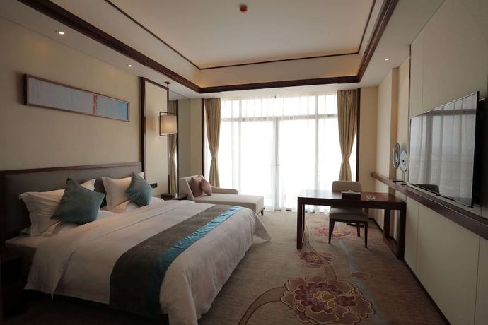 Imagen de la habitación del Hotel Ramada By Wyndham Kunming Yiliang. Foto 4