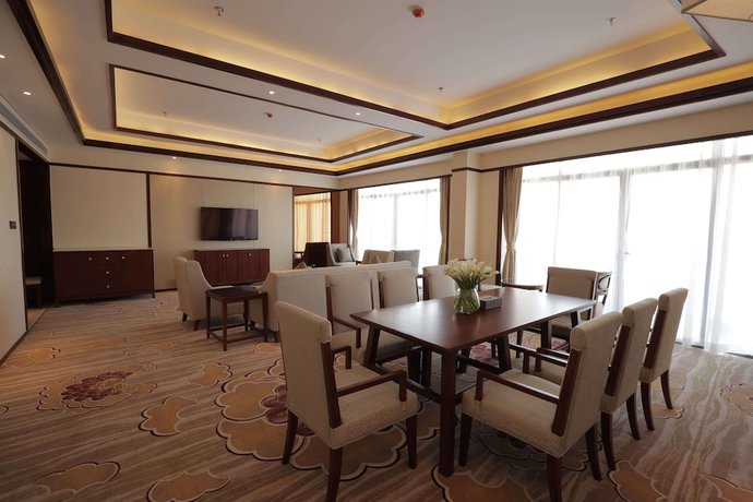 Imagen de la habitación del Hotel Ramada By Wyndham Kunming Yiliang. Foto 5