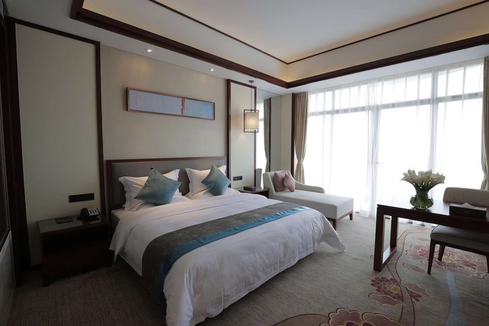 Imagen de la habitación del Hotel Ramada By Wyndham Kunming Yiliang. Foto 6