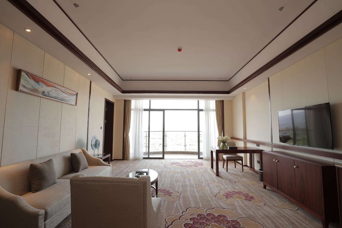 Imagen de la habitación del Hotel Ramada By Wyndham Kunming Yiliang. Foto 7