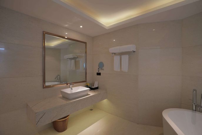 Imagen de la habitación del Hotel Ramada By Wyndham Kunming Yiliang. Foto 8