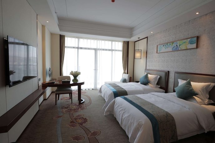 Imagen de la habitación del Hotel Ramada By Wyndham Kunming Yiliang. Foto 9