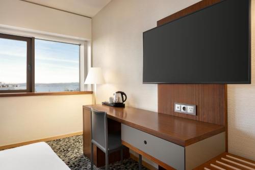 Imagen de la habitación del Hotel Ramada By Wyndham Lisbon. Foto 5