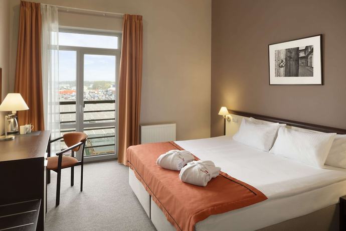 Imagen de la habitación del Hotel Ramada By Wyndham Lviv. Foto 4