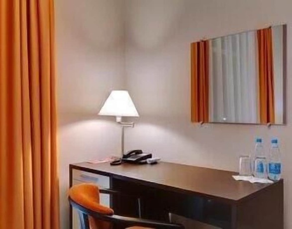 Imagen de la habitación del Hotel Ramada By Wyndham Lviv. Foto 6