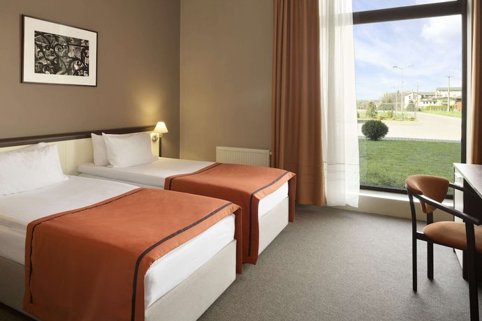 Imagen de la habitación del Hotel Ramada By Wyndham Lviv. Foto 7