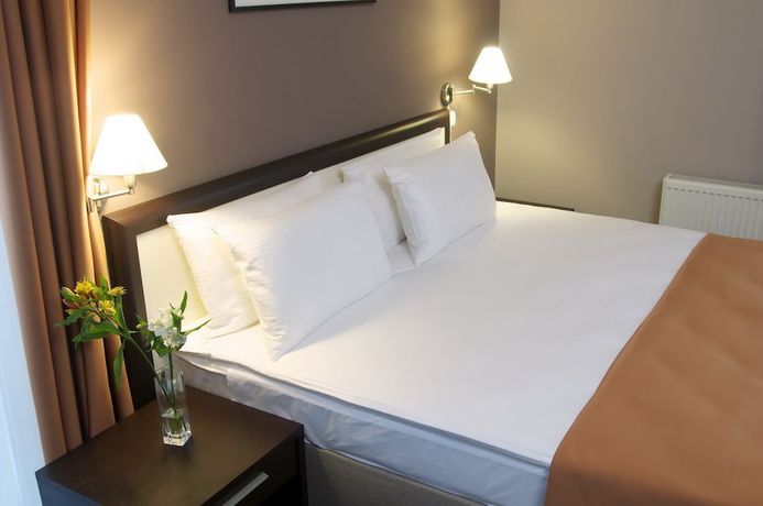 Imagen de la habitación del Hotel Ramada By Wyndham Lviv. Foto 8