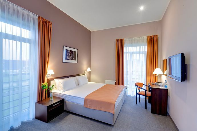 Imagen de la habitación del Hotel Ramada By Wyndham Lviv. Foto 12