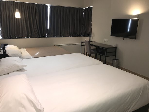 Imagen de la habitación del Hotel Ramada By Wyndham Madrid Tres Cantos. Foto 12