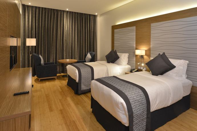 Imagen de la habitación del Hotel Ramada By Wyndham Manama City Centre. Foto 14