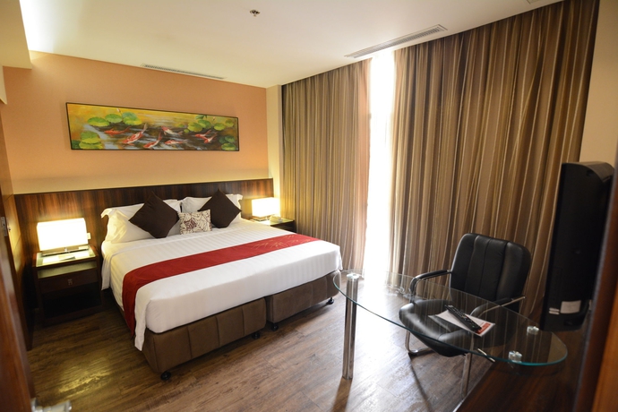 Imagen de la habitación del Hotel Ramada By Wyndham Manila Central. Foto 3