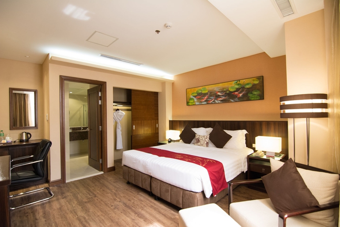 Imagen de la habitación del Hotel Ramada By Wyndham Manila Central. Foto 7