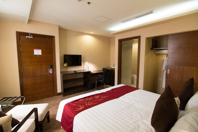 Imagen de la habitación del Hotel Ramada By Wyndham Manila Central. Foto 8