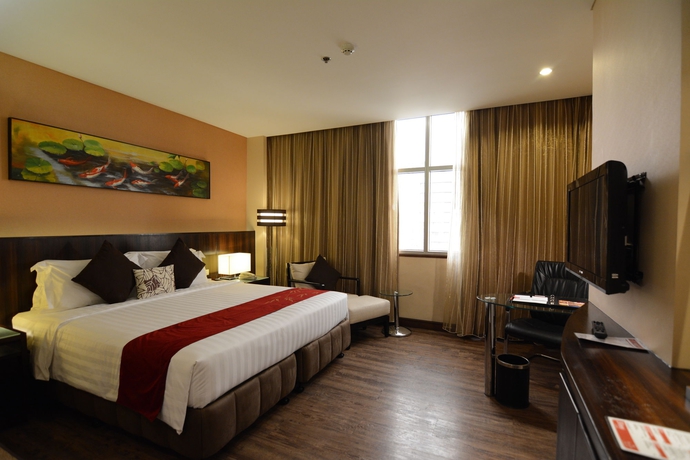 Imagen de la habitación del Hotel Ramada By Wyndham Manila Central. Foto 11