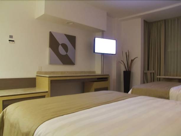 Imagen de la habitación del Hotel Ramada By Wyndham Mexico City Santa Fe. Foto 6