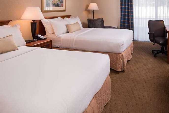 Imagen de la habitación del Hotel Ramada By Wyndham Midtown Grand Island. Foto 5