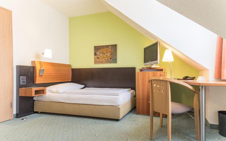 Imagen de la habitación del Hotel Ramada By Wyndham Muenchen Airport. Foto 5