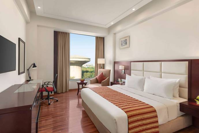 Imagen de la habitación del Hotel Ramada By Wyndham New Delhi Pitampura. Foto 9
