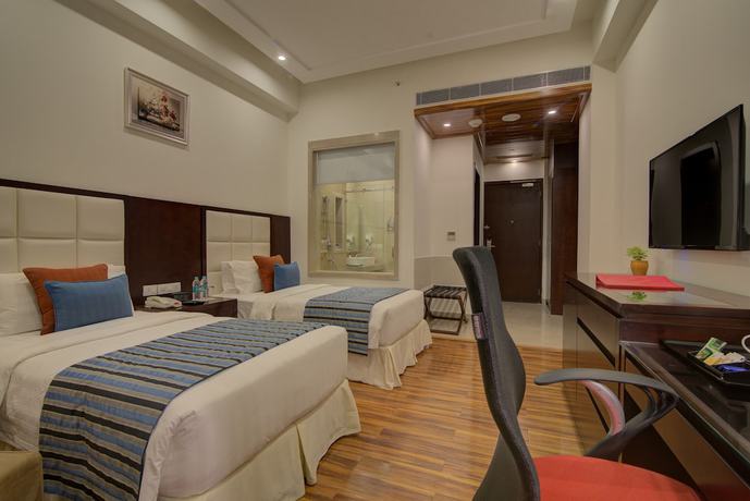 Imagen de la habitación del Hotel Ramada By Wyndham New Delhi Pitampura. Foto 10