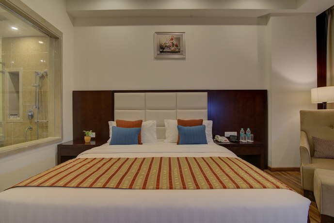 Imagen de la habitación del Hotel Ramada By Wyndham New Delhi Pitampura. Foto 14