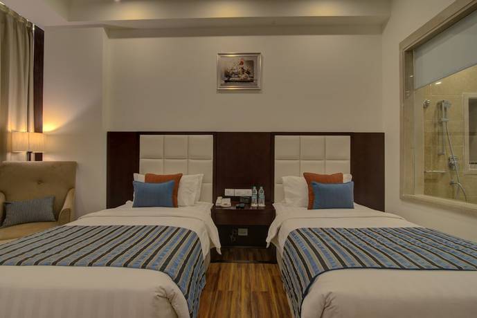 Imagen de la habitación del Hotel Ramada By Wyndham New Delhi Pitampura. Foto 16