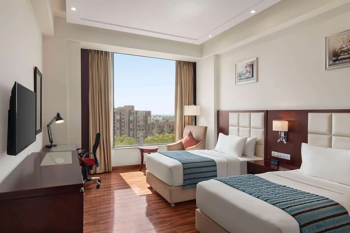 Imagen de la habitación del Hotel Ramada By Wyndham New Delhi Pitampura. Foto 18