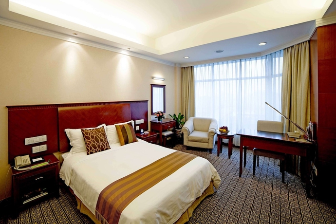 Imagen de la habitación del Hotel Ramada By Wyndham Pearl Guangzhou. Foto 6