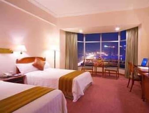 Imagen de la habitación del Hotel Ramada By Wyndham Pearl Guangzhou. Foto 10
